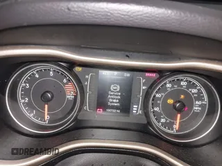 2016 Jeep Cherokee Altitude with VIN 1C4PJMCB6GW295404, listed as a IAAI auction lot 41211758 with 100,722 mi miles and . Bid and sale history available at DreamBid. Image 7.