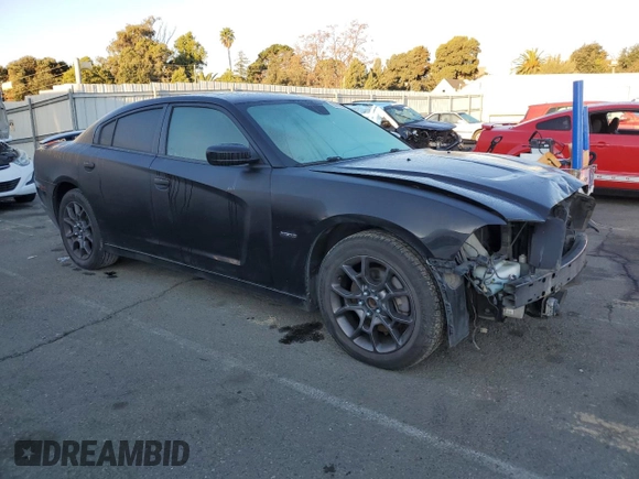 2011 Dodge Charger RT Plus with VIN 2B3CM5CT6BH517548, listed as a Copart auction lot 82219834 with 114,134 mi miles and Salvage Title. Bid and sale history available at carsss.com. Image 4.