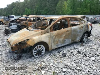 2018 Ford Focus SE z VIN 1FADP3FE4JL265608, wystawiony jako Copart lot #50029575 z przebiegiem Nie podano mil oraz Szkoda całkowita • Salvage title. Historia ofert i sprzedaży dostępna na DreamBid. Obrazek 1.