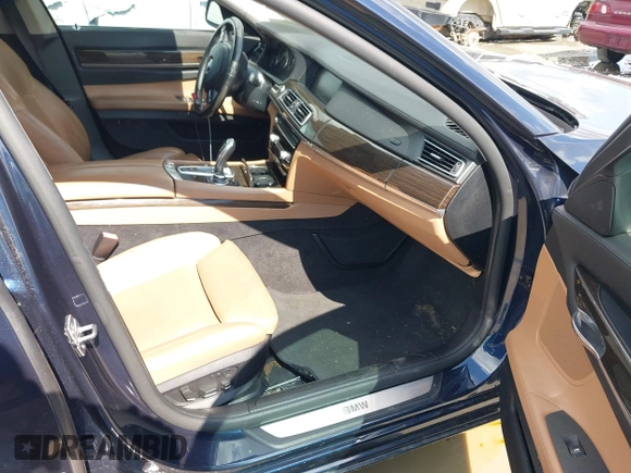 2012 BMW 7 Series 750Li with VIN WBAKB8C50CC963425, listed as a IAAI auction lot 42543576 with 132,054 mi miles and . Bid and sale history available at DreamBid. Image 5.