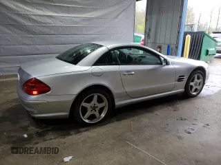 2003 Mercedes-Benz SL 500 z VIN WDBSK75FX3F061879, wystawiony jako Copart lot #55930265 z przebiegiem 117 824 mil mil oraz Tytuł czysty. Historia ofert i sprzedaży dostępna na DreamBid. Obrazek 3.