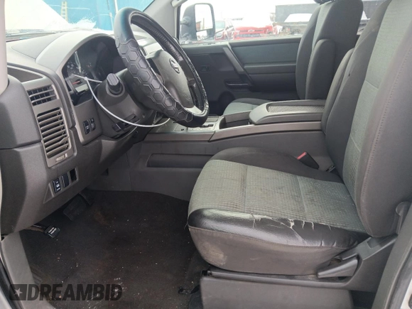 2005 Nissan Titan SE with VIN 1N6BA07B15N535701, listed as a Copart auction lot 46502565 with 180,923 mi miles and Salvage Title. Bid and sale history available at DreamBid. Image 7.