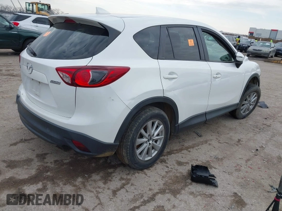 2016 Mazda CX-5 Touring with VIN JM3KE2CY1G0888850, listed as a IAAI auction lot 41562701 with 1 mi miles. Bid and sale history available at carsss.com. Image 4.