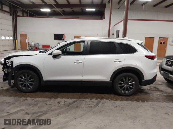 2022 Mazda CX-9 Sport z VIN JM3TCBBYXN0603653, wystawiony jako IAAI lot #42325893 z przebiegiem 57 480 mil mil oraz . Historia ofert i sprzedaży dostępna na DreamBid. Obrazek 14.