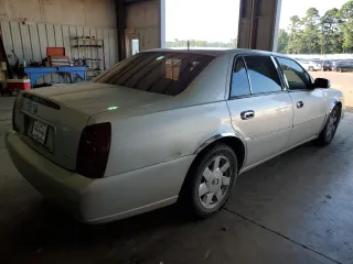 2002 Cadillac DeVille DTS with VIN 1G6KF57952U303332, listed as a Copart auction lot 61852523 with 173,500 mi miles and Clean Title. Bid and sale history available at carsss.com. Image 3.