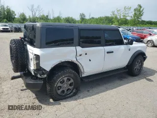 2023 Ford Bronco z VIN 1FMDE5BH2PLB20499, wystawiony jako Copart lot #62211165 z przebiegiem 28 372 mil mil oraz Szkoda całkowita • Salvage title. Historia ofert i sprzedaży dostępna na DreamBid. Obrazek 3.