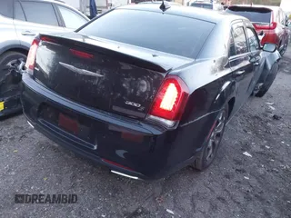 2015 Chrysler 300 with VIN 2C3CCAGG7FH904546, listed as a IAAI auction lot 41204780 with 75,978 mi miles. Bid and sale history available at carsss.com. Image 4.