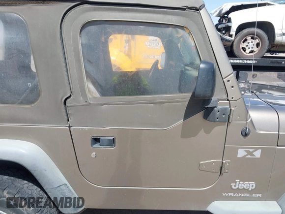 2003 Jeep Wrangler X with VIN 1J4FA39S03P312550, listed as a IAAI auction lot 41837150 with 127,239 mi miles and . Bid and sale history available at DreamBid. Image 13.