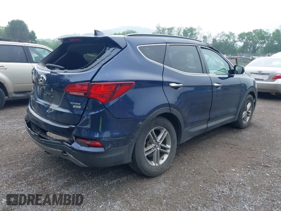 2017 Hyundai Santa Fe 2.4L z VIN 5XYZUDLB9HG421284, wystawiony jako IAAI lot #42441436 z przebiegiem 96 155 mil mil oraz . Historia ofert i sprzedaży dostępna na DreamBid. Obrazek 4.