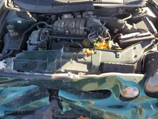 1999 Ford Taurus SE with VIN 1FAFP53U6XA242920, listed as a Copart auction lot 77883994 with 115,000 mi miles and Salvage Title. Bid and sale history available at carsss.com. Image 11.