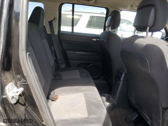 2014 Jeep Patriot Latitude with VIN 1C4NJRFBXED898378, listed as a Copart auction lot 50497675 with 179,485 mi miles and Clean Title. Bid and sale history available at carsss.com. Image 11.