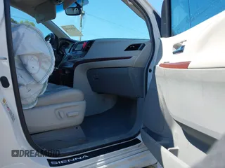 2014 Toyota Sienna XLE z VIN 5TDYK3DC7ES431782, wystawiony jako IAAI lot #41975182 z przebiegiem 191 870 mil mil oraz . Historia ofert i sprzedaży dostępna na DreamBid. Obrazek 5.