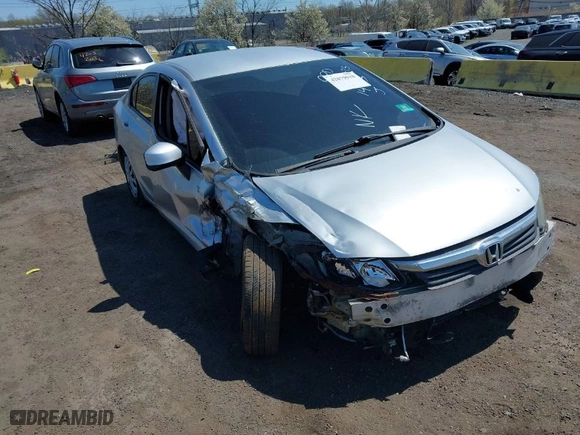 2012 Honda Civic Sdn LX with VIN 2HGFB2F56CH314403, listed as a IAAI auction lot 42079018 with 103,153 mi miles. Bid and sale history available at carsss.com. Image 1.