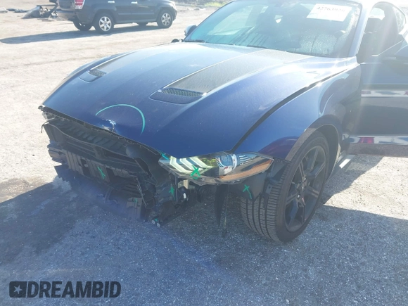 2019 Ford Mustang GT z VIN 1FA6P8CF5K5180706, wystawiony jako IAAI lot #42763920 z przebiegiem 73 915 mil mil oraz . Historia ofert i sprzedaży dostępna na DreamBid. Obrazek 18.
