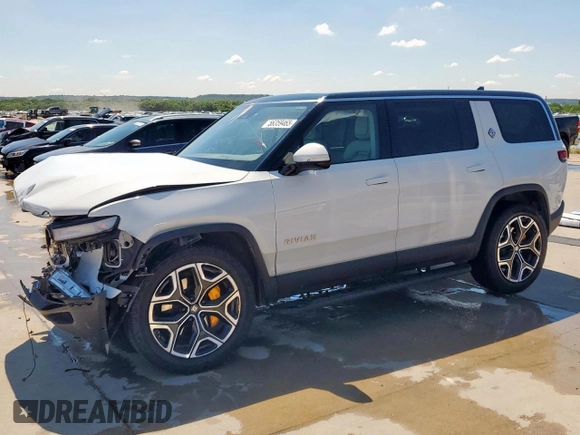 2023 Rivian R1S Launch Edition z VIN 7PDSGABL9PN010792, wystawiony jako Copart lot #56359465 z przebiegiem 24 319 mil mil oraz Szkoda całkowita • Salvage title. Historia ofert i sprzedaży dostępna na DreamBid. Obrazek 1.