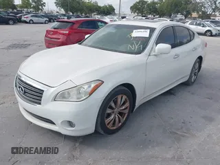 2012 Infiniti M with VIN JN1BY1AP0CM334130, listed as a IAAI auction lot 42096106 with 137,460 mi miles and . Bid and sale history available at DreamBid. Image 2.