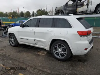2019 Jeep Grand Cherokee Overland with VIN 1C4RJFCT7KC640527, listed as a Copart auction lot 54276725 with 282,202 mi miles and Salvage title. Bid and sale history available at DreamBid. Image 2.