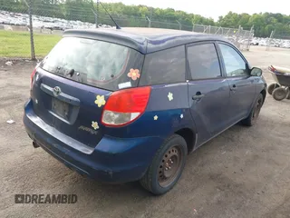 2003 Toyota Matrix Std with VIN 2T1KR32EX3C012210, listed as a IAAI auction lot 42152686 with 299,999 mi miles. Bid and sale history available at carsss.com. Image 4.