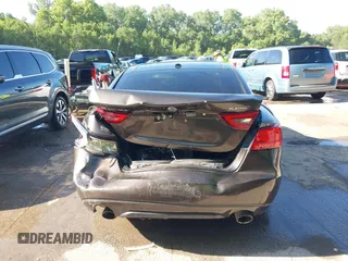 2016 Nissan Maxima Platinum z VIN 1N4AA6AP3GC385276, wystawiony jako IAAI lot #42547410 z przebiegiem 100 307 mil mil oraz . Historia ofert i sprzedaży dostępna na DreamBid. Obrazek 6.