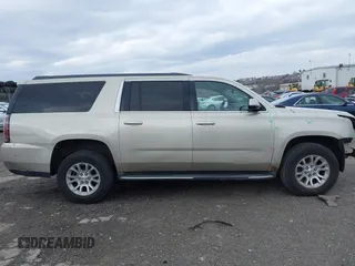 2015 GMC Yukon XL SLT with VIN 1GKS2HKC7FR100534, listed as a IAAI auction lot 41229658 with 207,947 mi miles. Bid and sale history available at carsss.com. Image 12.