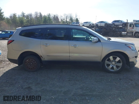 2013 Chevrolet Traverse LTZ z VIN 1GNKVLKD1DJ202428, wystawiony jako IAAI lot #42134820 z przebiegiem 126 532 mil mil oraz . Historia ofert i sprzedaży dostępna na DreamBid. Obrazek 14.
