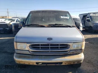 1999 Ford Econoline Passenger XL with VIN 1FBSS31L6XHB60672, listed as a Copart auction lot 79319714 with 295,551 mi miles and Clean Title. Bid and sale history available at DreamBid. Image 5.