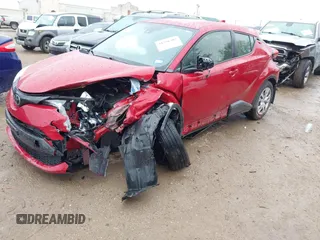 2020 Toyota C-HR LE with VIN JTNKHMBX4L1067648, listed as a IAAI auction lot 41556302 with 64,698 mi miles. Bid and sale history available at carsss.com. Image 6.