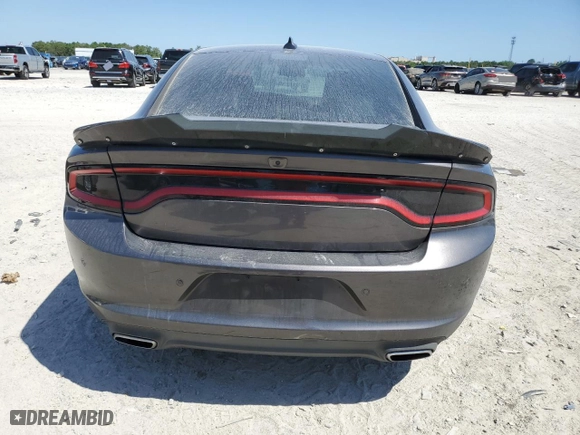 2015 Dodge Charger SXT with VIN 2C3CDXHG6FH857590, listed as a Copart auction lot 53107315 with 148,019 mi miles and Salvage Title. Bid and sale history available at carsss.com. Image 6.