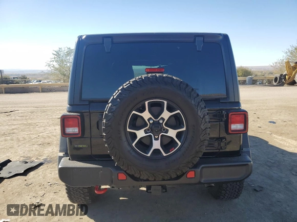 2022 Jeep Wrangler Unlimited Rubicon with VIN 1C4JJXFM6NW175930, listed as a Copart auction lot 80345034 with 27,265 mi miles and Salvage title. Bid and sale history available at DreamBid. Image 6.