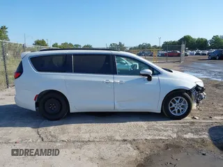 2022 Chrysler Pacifica Touring L with VIN 2C4RC1BGXNR233654, listed as a IAAI auction lot 42137632 with 73,899 mi miles and . Bid and sale history available at DreamBid. Image 14.