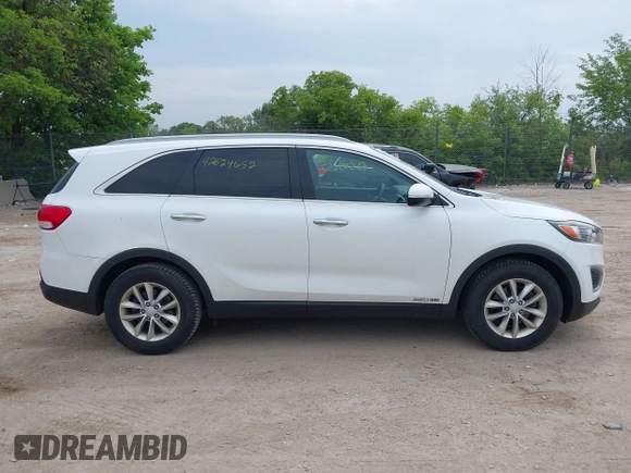 2017 Kia Sorento LX with VIN 5XYPGDA57HG216333, listed as a IAAI auction lot 42524652 with 214,700 mi miles and . Bid and sale history available at DreamBid. Image 13.