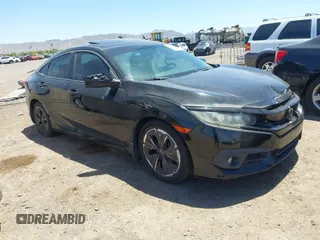 2016 Honda Civic EX-T with VIN 19XFC1F36GE005584, listed as a IAAI auction lot 42574277 with 137,578 mi miles and . Bid and sale history available at DreamBid. Image 1.