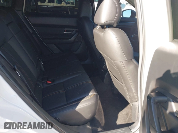 2024 Mazda CX-50 Premium z VIN 7MMVABDY0RN186511, wystawiony jako IAAI lot #41229255 z przebiegiem 21 842 mil mil oraz . Historia ofert i sprzedaży dostępna na DreamBid. Obrazek 8.