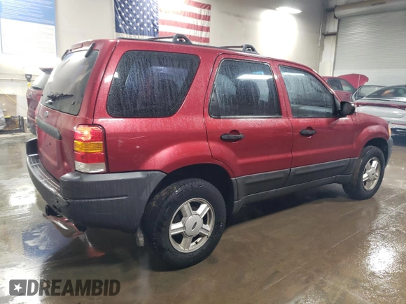 2004 Ford Escape XLS with VIN 1FMYU021X4DA05312, listed as a Copart auction lot 86185954 with 186,010 mi miles and Salvage Title. Bid and sale history available at DreamBid. Image 3.