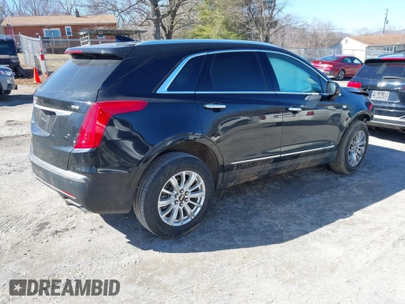 2018 Cadillac XT5 FWD with VIN 1GYKNARS5JZ235585, listed as a IAAI auction lot 41607440 with 77,220 mi miles and . Bid and sale history available at DreamBid. Image 4.