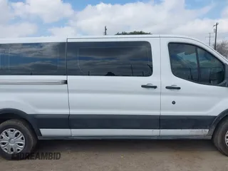 2019 Ford Transit Passenger XL with VIN 1FBZX2YM5KKA48112, listed as a IAAI auction lot 41518013 with 163,856 mi miles and . Bid and sale history available at DreamBid. Image 14.