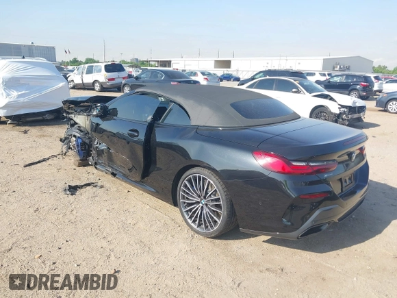 2022 BMW 8 Series with VIN WBAFY4C04NCJ78602, listed as a IAAI auction lot 42034279 with 11,757 mi miles and . Bid and sale history available at DreamBid. Image 3.