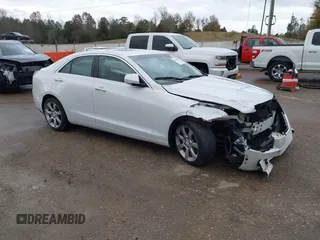 2015 Cadillac ATS Sedan Luxury RWD with VIN 1G6AB5RA5F0106723, listed as a IAAI auction lot 41108285 with 136,998 mi miles. Bid and sale history available at carsss.com. Image 1.