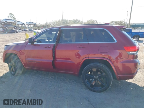 2014 Jeep Grand Cherokee Laredo with VIN 1C4RJEAG3EC519708, listed as a IAAI auction lot 41616364 with 131,184 mi miles. Bid and sale history available at carsss.com. Image 13.