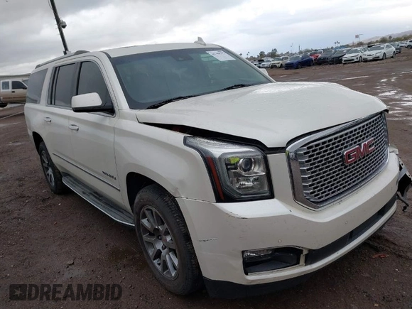 2015 GMC Yukon XL Denali with VIN 1GKS2JKJ2FR590502, listed as a IAAI auction lot 41758575 with 129,777 mi miles. Bid and sale history available at carsss.com. Image 1.
