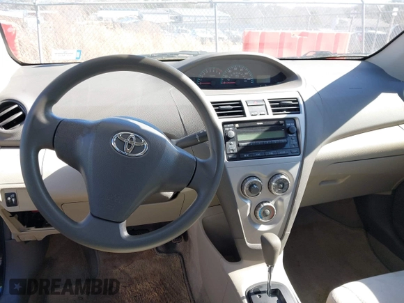 2009 Toyota Yaris z VIN JTDBT903291338232, wystawiony jako IAAI lot #41699916 z przebiegiem Nie podano mil oraz . Historia ofert i sprzedaży dostępna na DreamBid. Obrazek 15.