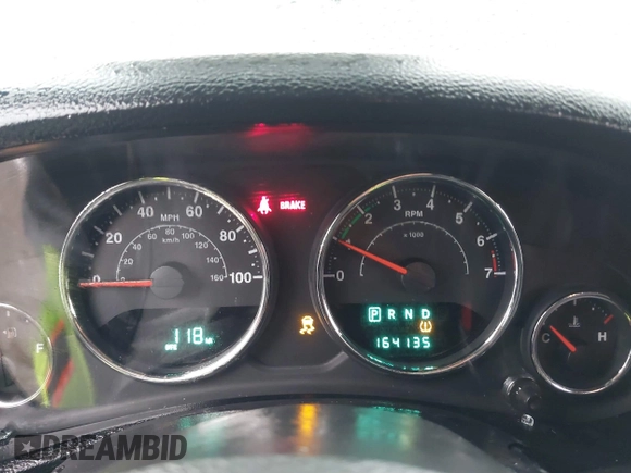 2012 Jeep Wrangler Sport z VIN 1C4AJWAG8CL262755, wystawiony jako IAAI lot #41566823 z przebiegiem 164 135 mil mil oraz . Historia ofert i sprzedaży dostępna na DreamBid. Obrazek 7.