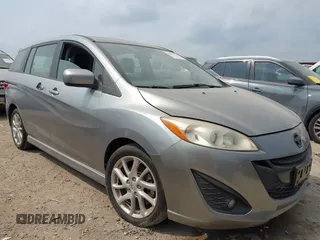 2012 Mazda 5 Grand Touring z VIN JM1CW2DL1C0126545, wystawiony jako IAAI lot #42301130 z przebiegiem 151 212 mil mil oraz . Historia ofert i sprzedaży dostępna na DreamBid. Obrazek 1.