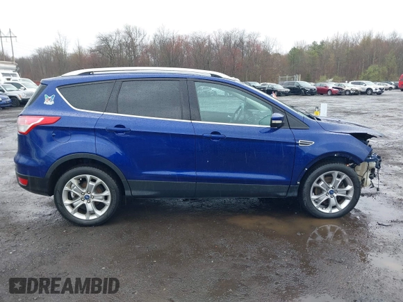2014 Ford Escape Titanium with VIN 1FMCU9J99EUA46103, listed as a IAAI auction lot 42018097 with 169,878 mi miles and . Bid and sale history available at DreamBid. Image 13.