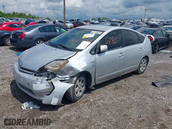 2007 Toyota Prius z VIN JTDKB20U677677900, wystawiony jako IAAI lot #42176780 z przebiegiem 246 442 mil mil oraz . Historia ofert i sprzedaży dostępna na DreamBid. Obrazek 2.