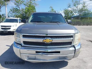 2013 Chevrolet Silverado 1500 LT with VIN 3GCPCSE01DG206827, listed as a IAAI auction lot 41976945 with 213,940 mi miles and . Bid and sale history available at DreamBid. Image 13.