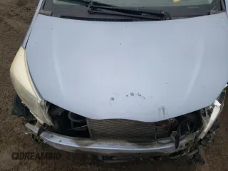 2012 Toyota Yaris L with VIN JTDKTUD33CD517298, listed as a Copart auction lot 52099335 with Not Provided miles and Salvage Title. Bid and sale history available at DreamBid. Image 11.