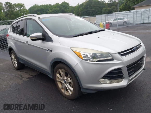 2014 Ford Escape Titanium с VIN 1FMCU0J98EUC28001, выставлен на аукционе IAAI как лот 42442784 с пробегом 163 159 миль миль и . История ставок и продаж доступна на DreamBid. Изображение 1.