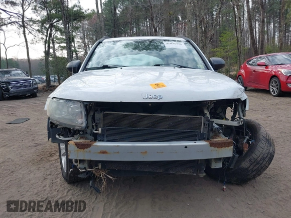 2014 Jeep Compass Sport with VIN 1C4NJCBB9ED547335, listed as a IAAI auction lot 41821726 with 144,100 mi miles and . Bid and sale history available at DreamBid. Image 6.
