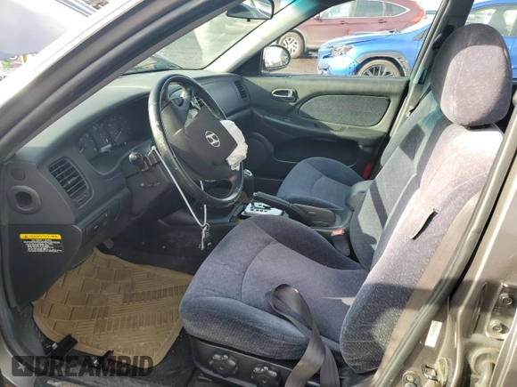 2002 Hyundai Sonata with VIN KMHWF25H52A617339, listed as a Copart auction lot 46359015 with 135,828 mi miles and Salvage Title. Bid and sale history available at carsss.com. Image 7.
